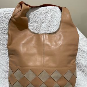 Soft buttery leather handbag with tan shoulder straps. Roomy interor